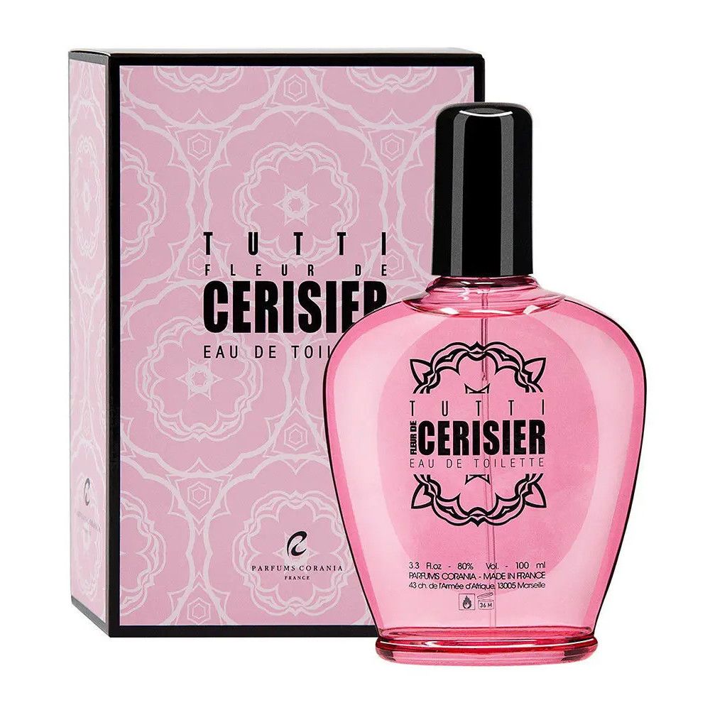 Flacon rose avec bouchon noir et emballage. Inscription: Tutti Fleur de Cerisier Eau de Toilette.
