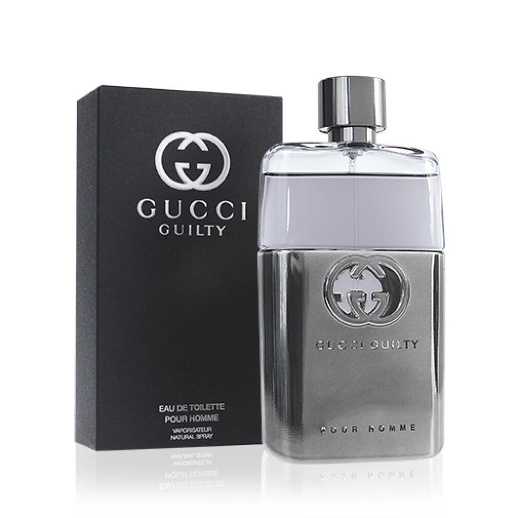 Gucci Guilty Pour Homme parfumfles en zwarte doos. Zilverkleurige fles met logo. Zwarte doos met logo en tekst.