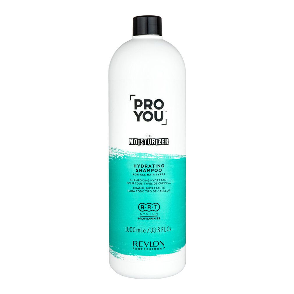 Witte fles met zwarte dop. Opschrift: PRO YOU, THE MOISTURIZER, HYDRATING SHAMPOO. Turquoise streep. Revlon Professional.
