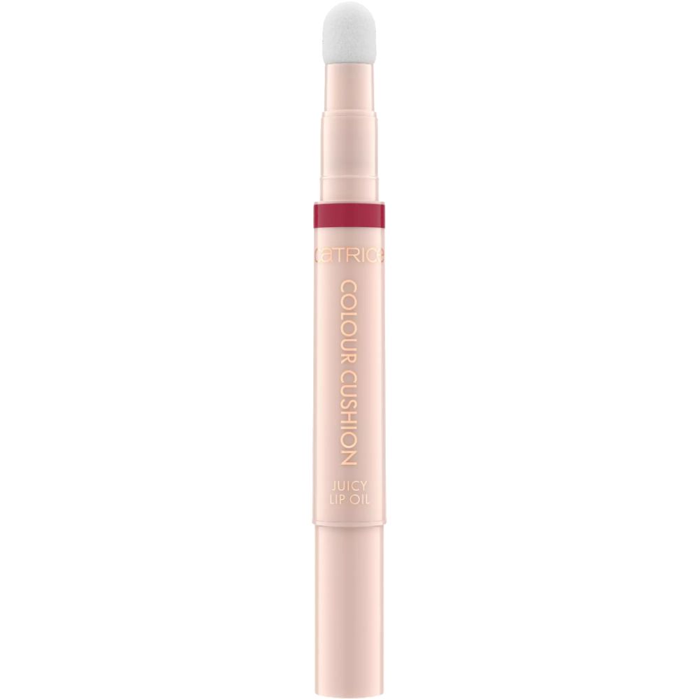 Lipolie met applicator. Roze houder met rode ring. Tekst: Colour Cushion Juicy Lip Oil. Witte applicator.
