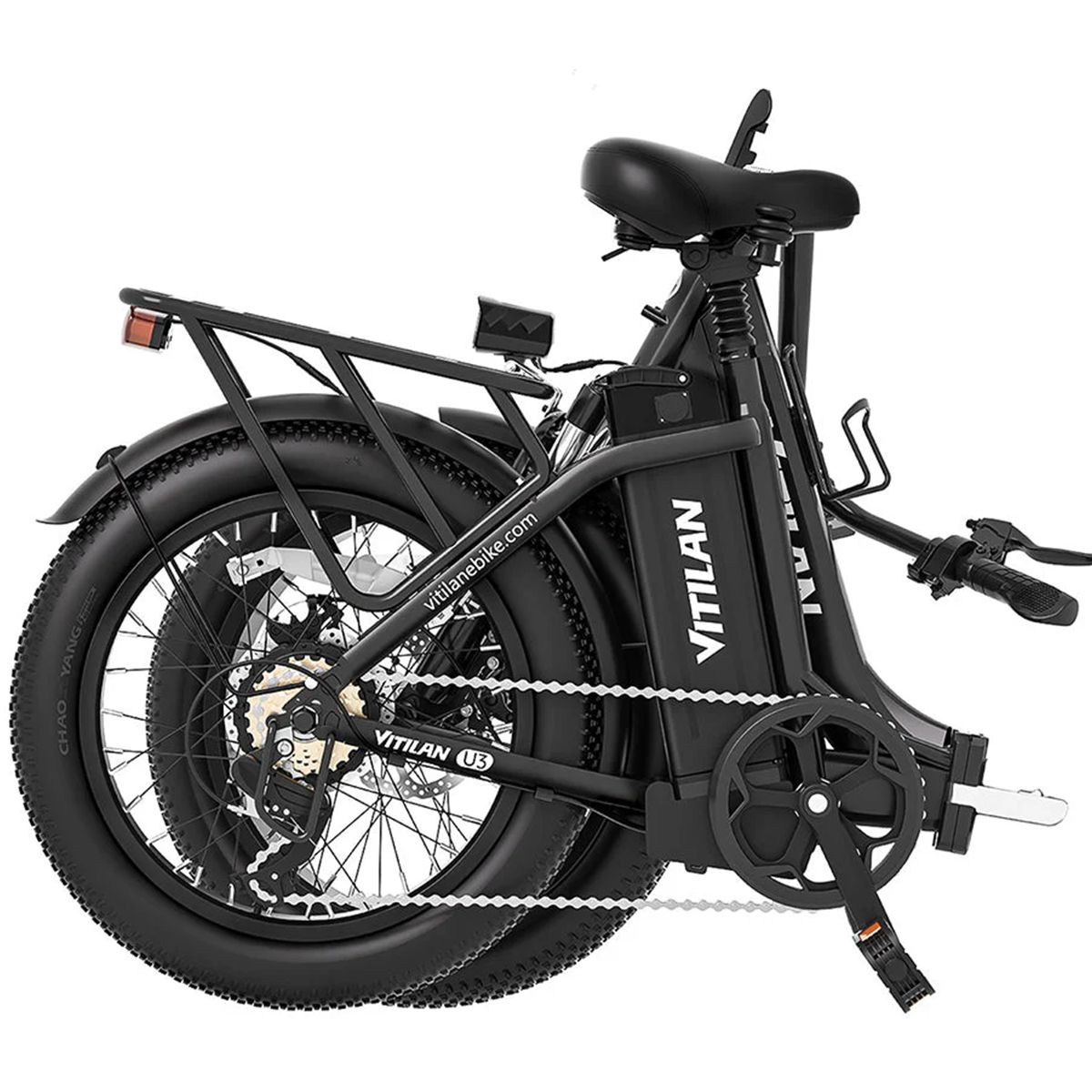 Vélo électrique noir plié avec pneus larges. Marque VITILAN.