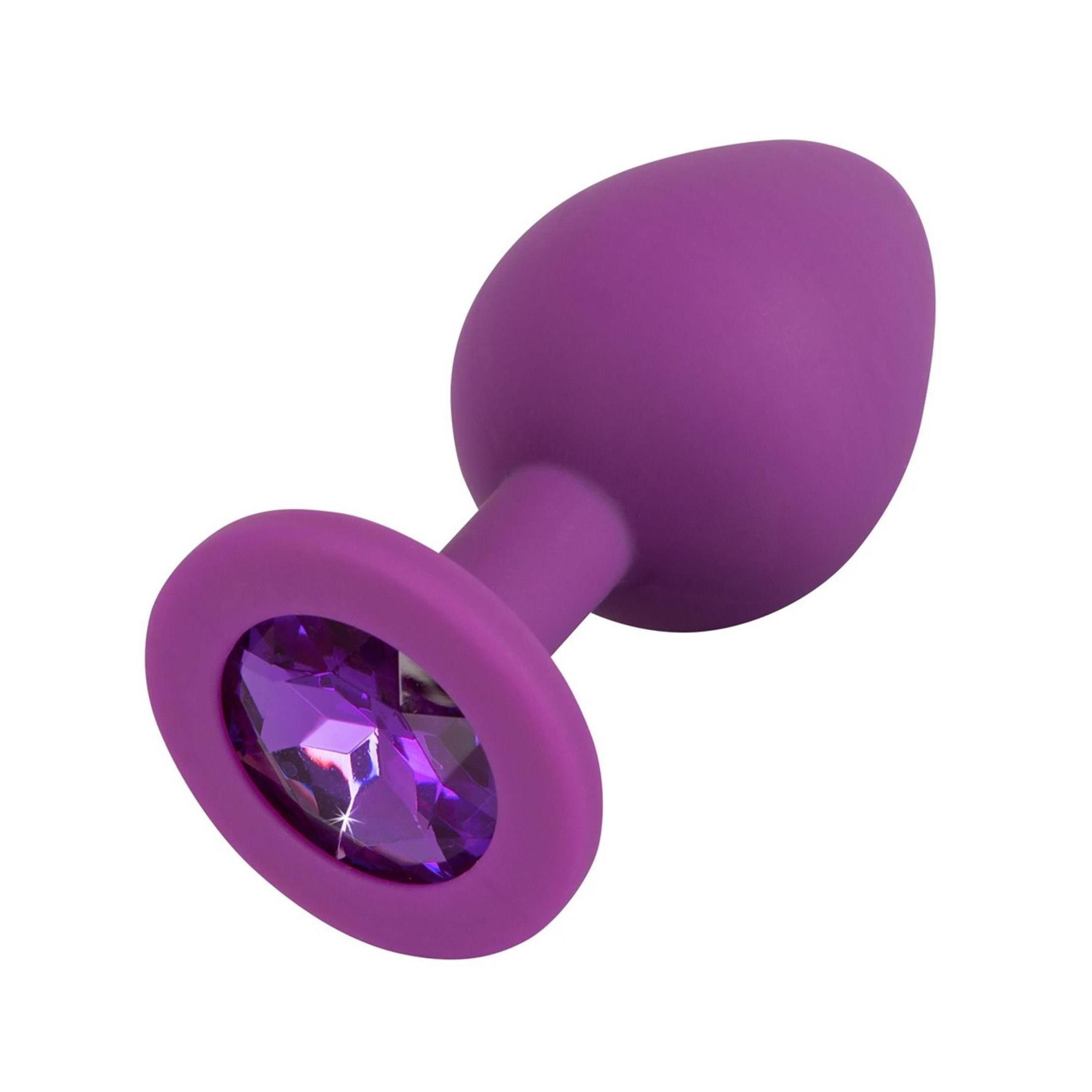 Plug anal violet avec bijou, vue latérale.