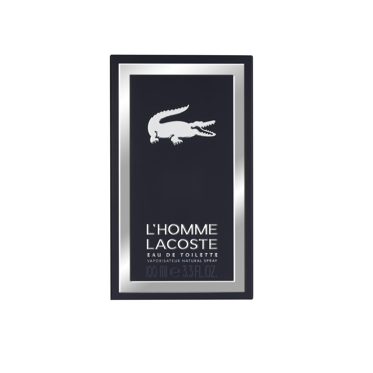 Zwarte doos van Lacoste L'Homme Eau de Toilette. Zilveren kader, krokodillenlogo. Tekst: L'Homme Lacoste, Eau de Toilette.