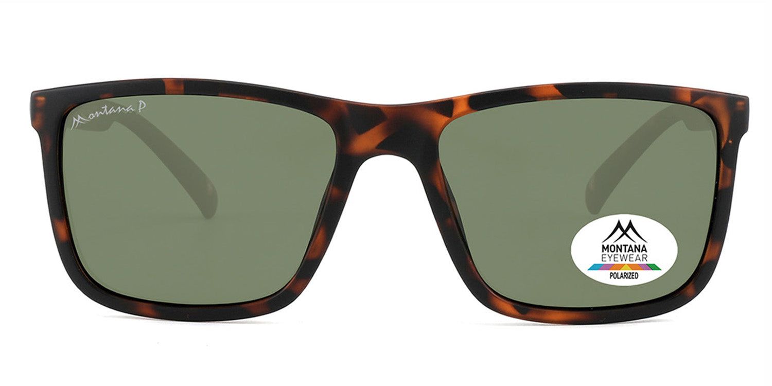Lunettes de soleil avec monture marron et verres verts. Un autocollant avec le logo Montana Eyewear est visible sur le verre droit.