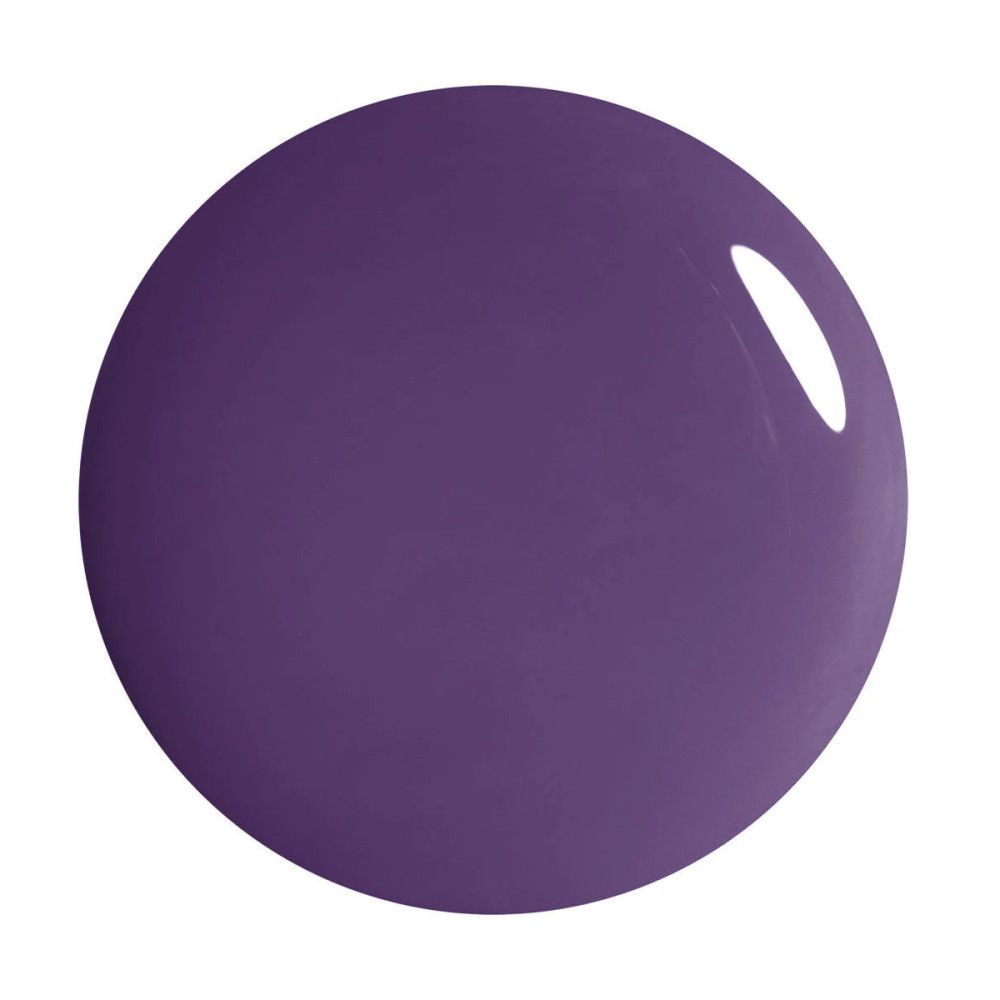 Tache ronde et brillante de couleur violet foncé. Reflet clair sur la surface.