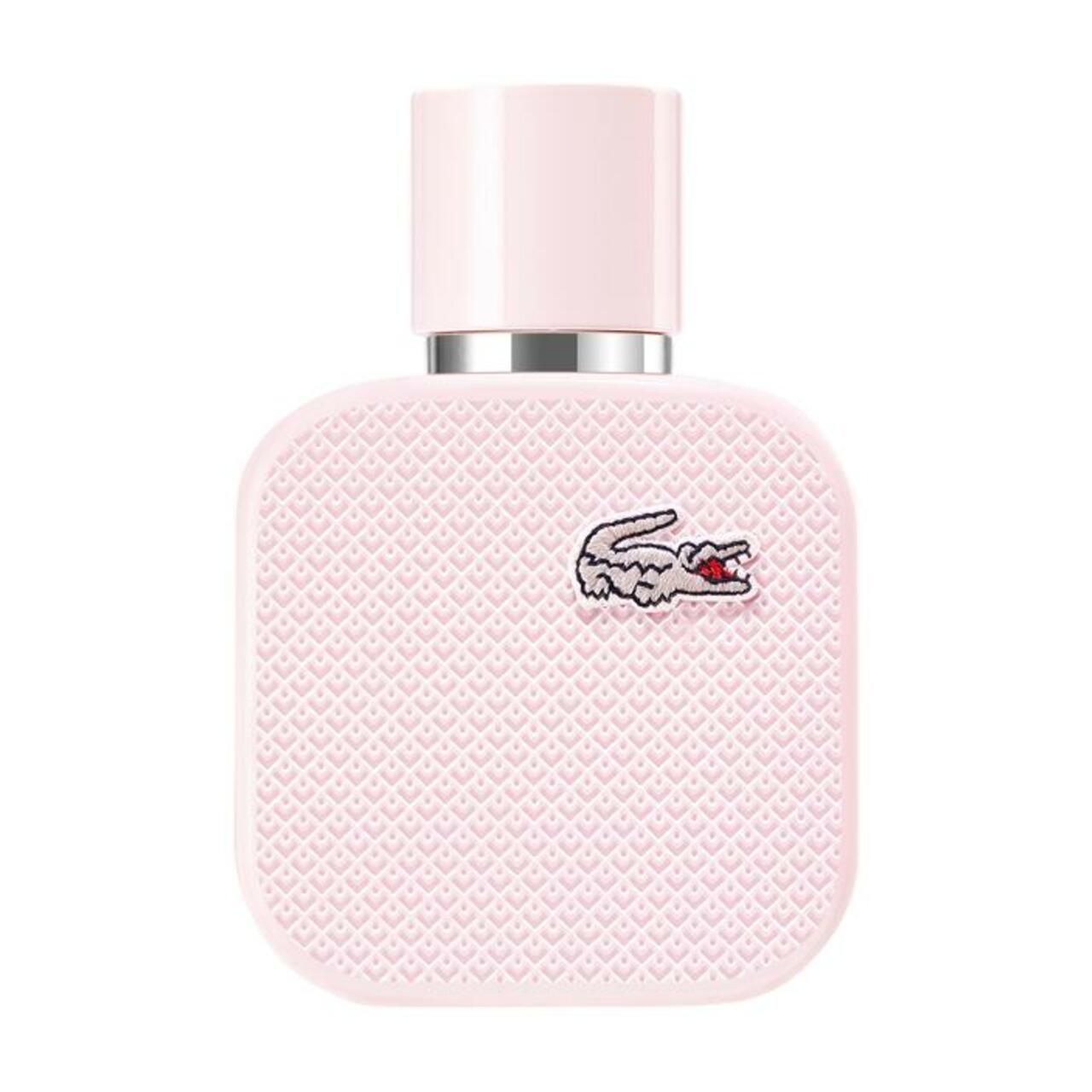 Flacon rose Lacoste L.12.12 Rose EdP Nat. Spray. Carré, avec logo crocodile. Bouchon rose. Col argenté.