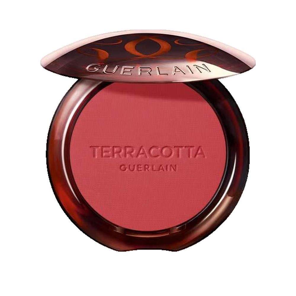 Ronde blush compactpoeder in een bruine houder. Opschrift "TERRACOTTA GUERLAIN". Deksel geopend.