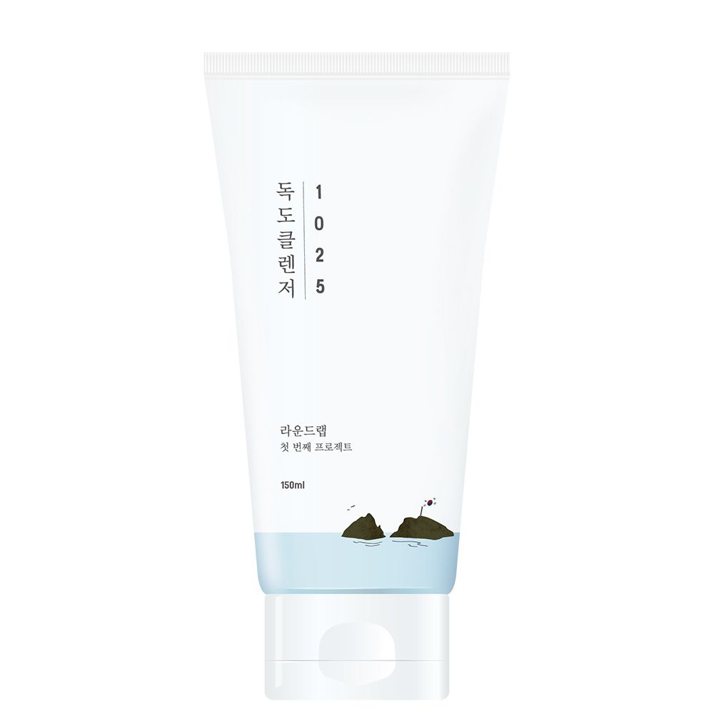 Tube blanc avec un design bleu représentant des rochers dans l'eau. 150ml.