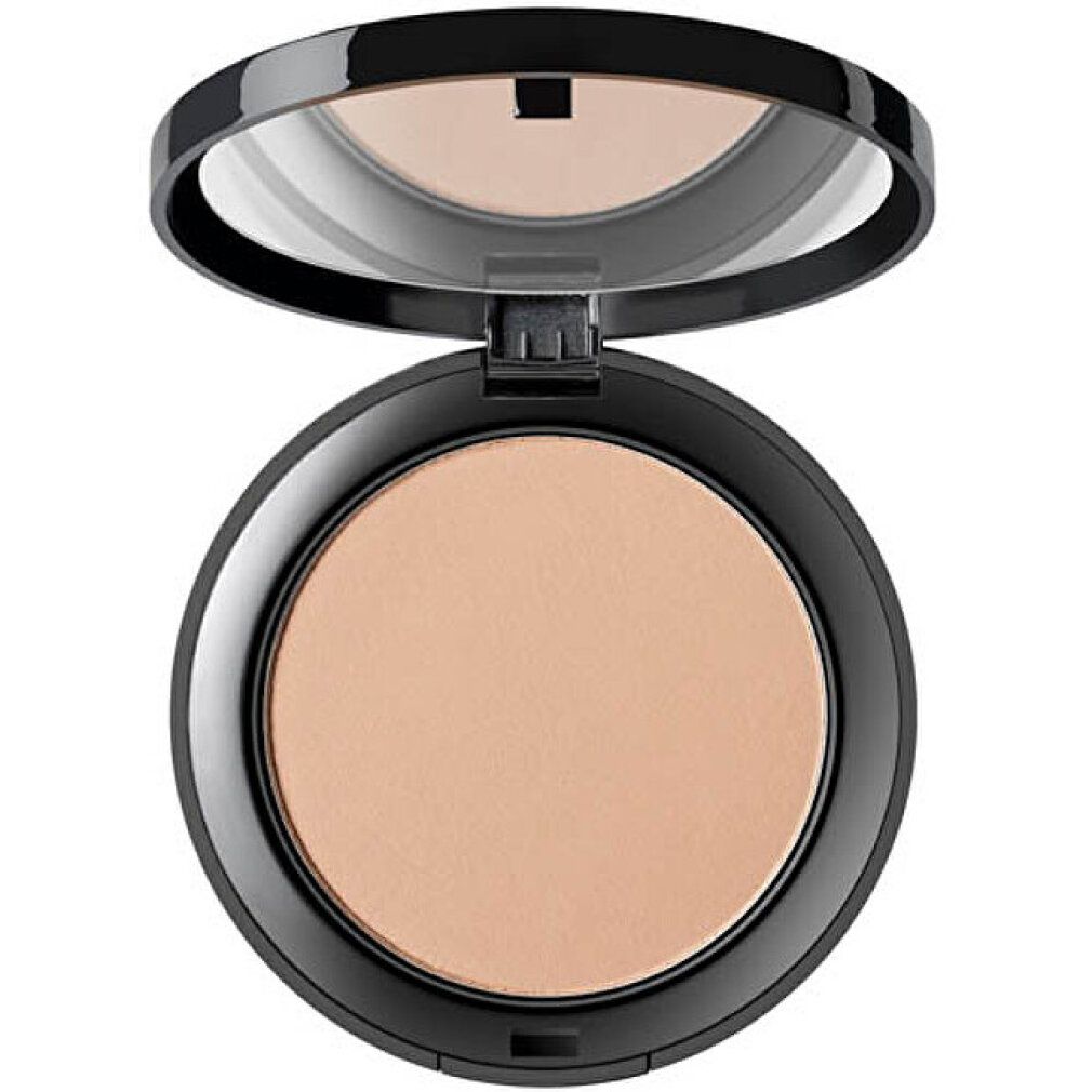 Poudre compacte dans un boîtier noir avec miroir. Couvercle ouvert. Poudre beige clair. Forme ronde.