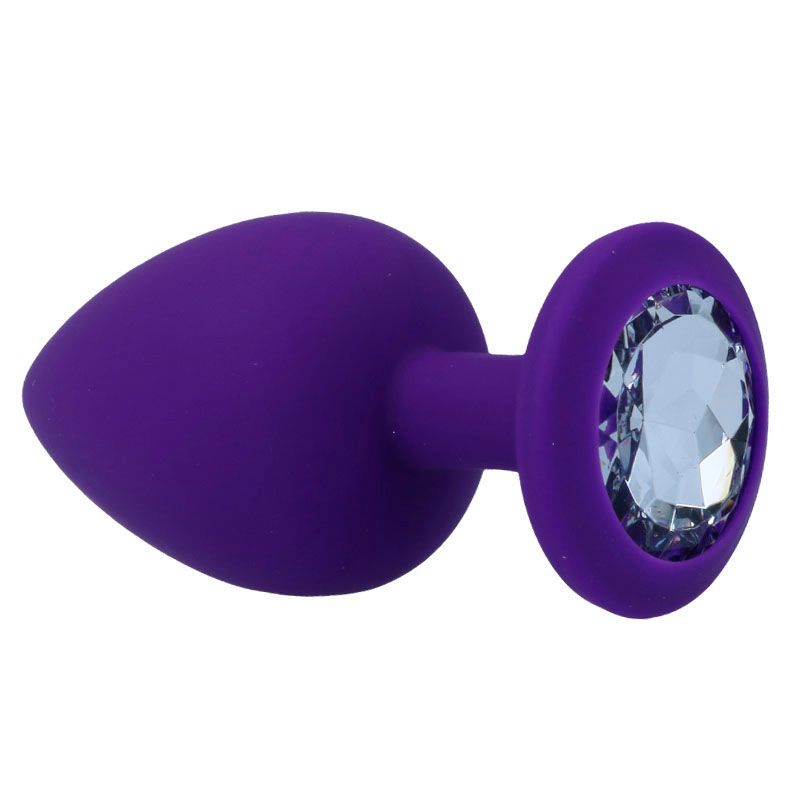 Plug anal violet avec décoration en cristal, vue de côté.