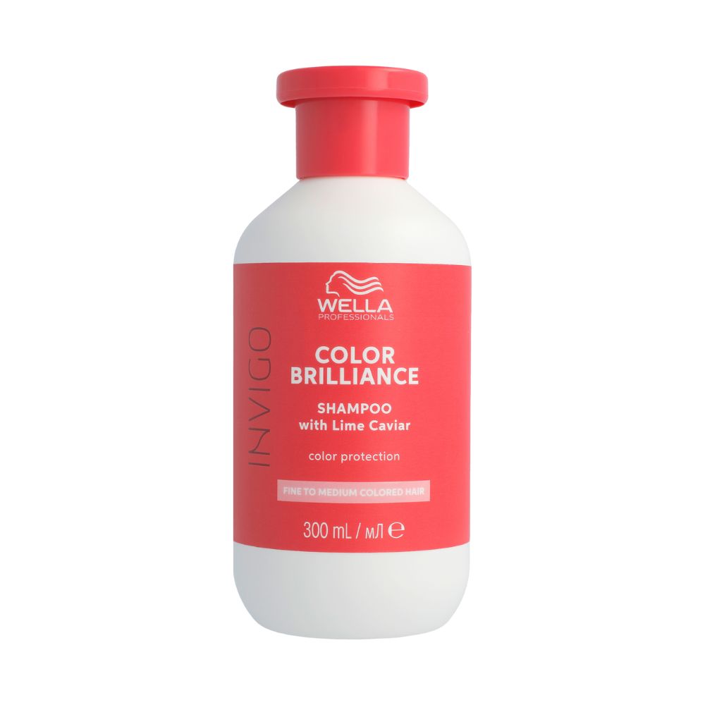 Flacon blanc, bouchon rouge. Inscription : Wella Color Brilliance Shampoo. 300 ml.