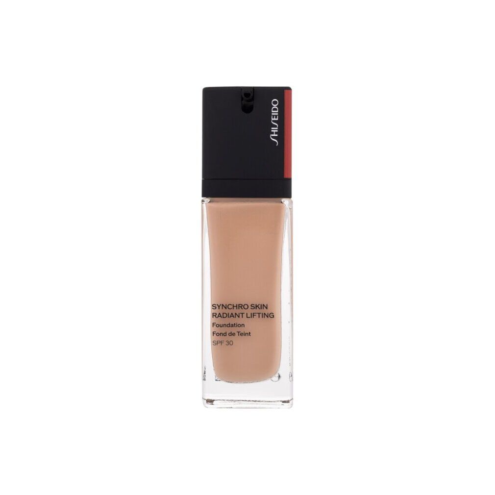 Flacon de fond de teint Shiseido Synchro Skin. Flacon en verre rectangulaire avec bouchon noir. Texte: Synchro Skin Radiant Lifting. SPF 30.