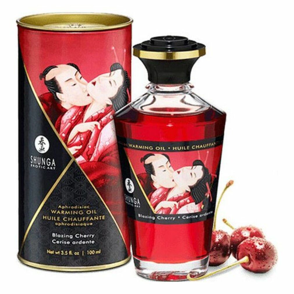 Flacon et boîte cylindrique. Liquide rouge. Illustration d'un couple s'embrassant. Texte: SHUNGA, Warming Oil, Blazing Cherry. Cerises.