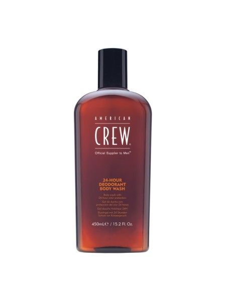Bruine fles met zwarte dop. Opschrift: AMERICAN CREW, 24-HOUR DEODORANT BODY WASH. 450ml/15.2 Fl. Oz.