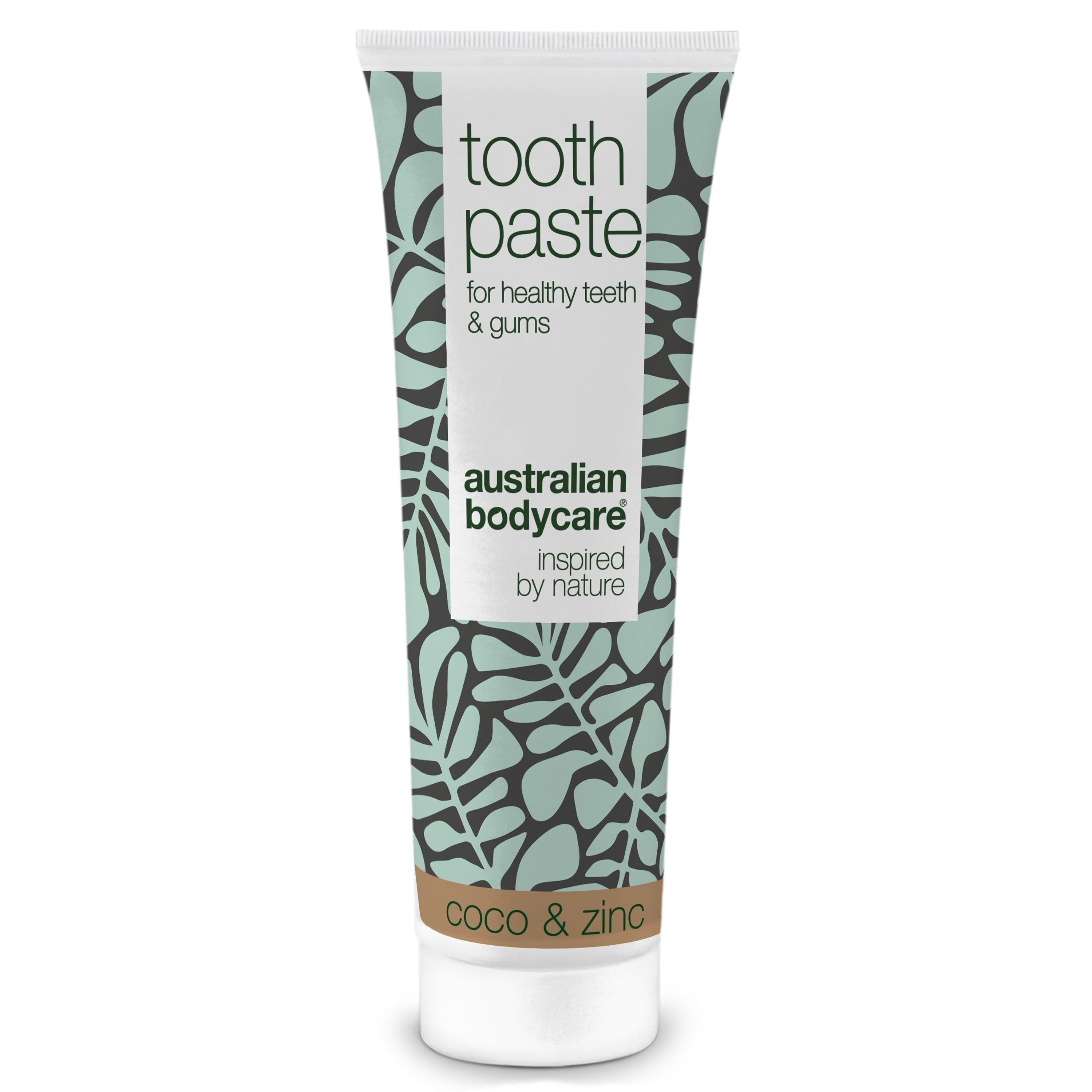 Tube de dentifrice avec motif floral. Inscription : Toothpaste, Australian Bodycare, Coco & Zinc.
