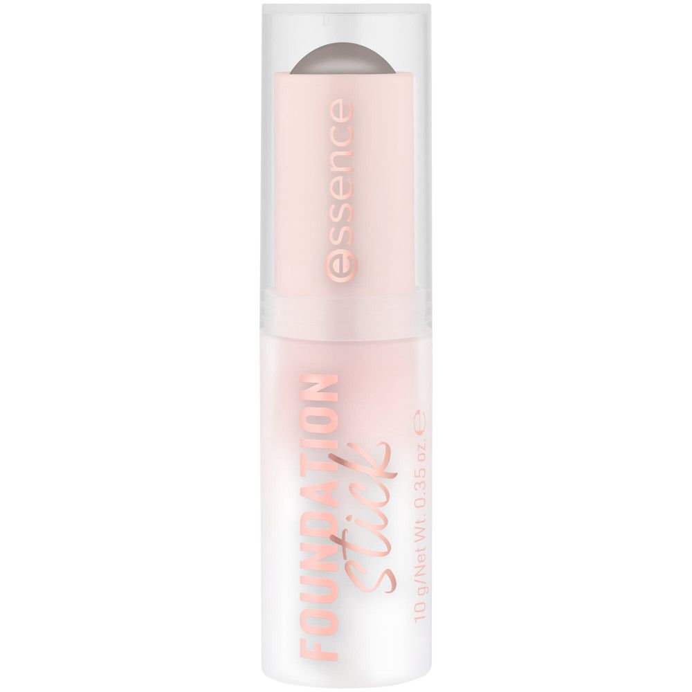 Stick de fond de teint, boîtier rose et blanc, capuchon transparent. Inscription: Foundation Stick, Essence. 10 g/Net Wt. 0.35 oz e.