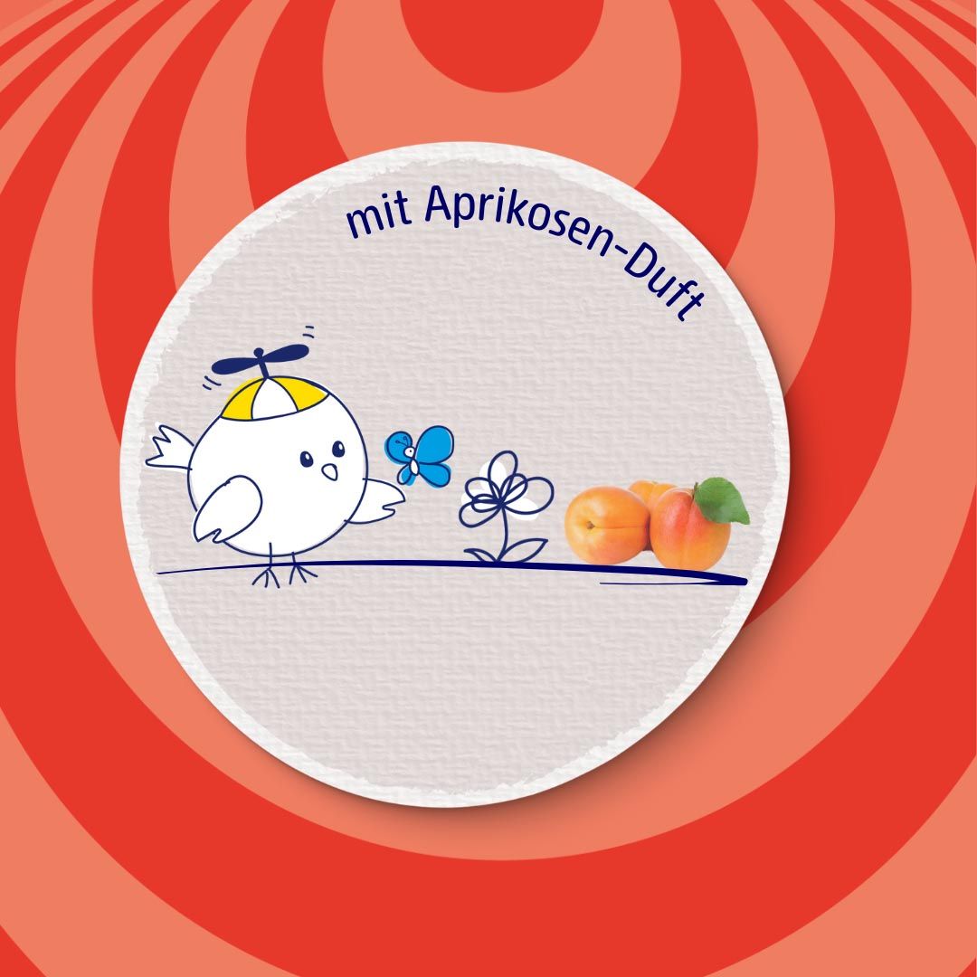 Rond etiket met cartoonfiguur, tekst: mit Aprikosen-Duft en afbeelding van abrikozen.