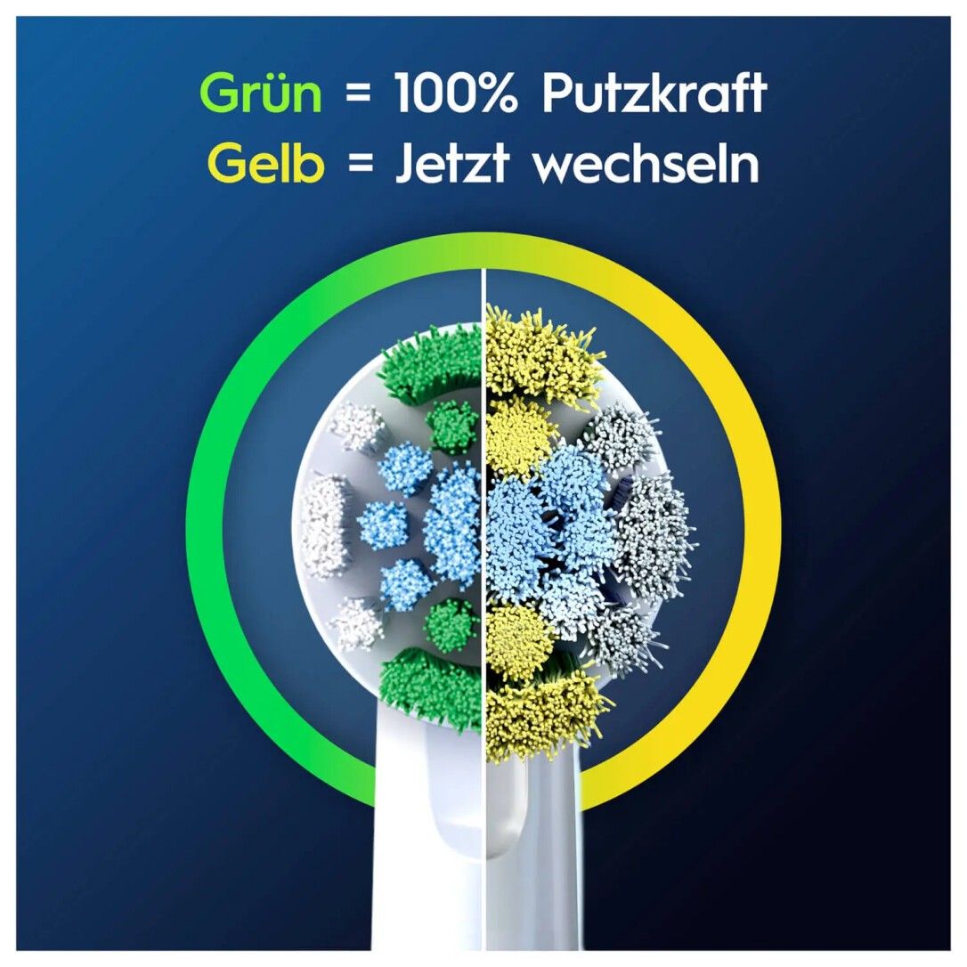 Gros plan d'une tête de brosse à dents. Vert = 100% de puissance de nettoyage, Jaune = Changer maintenant. Soies de différentes couleurs.