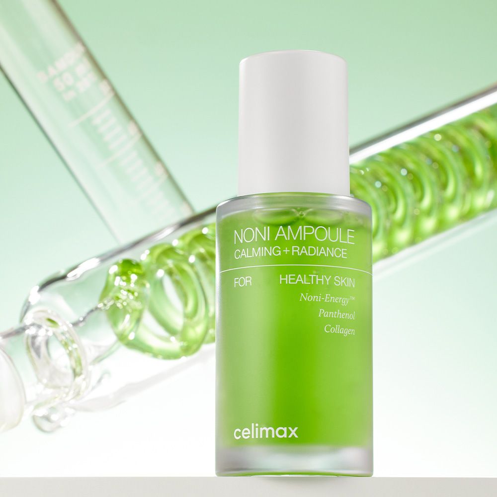 Ampoule Celimax Noni Energy devant un contenu vert en spirale.