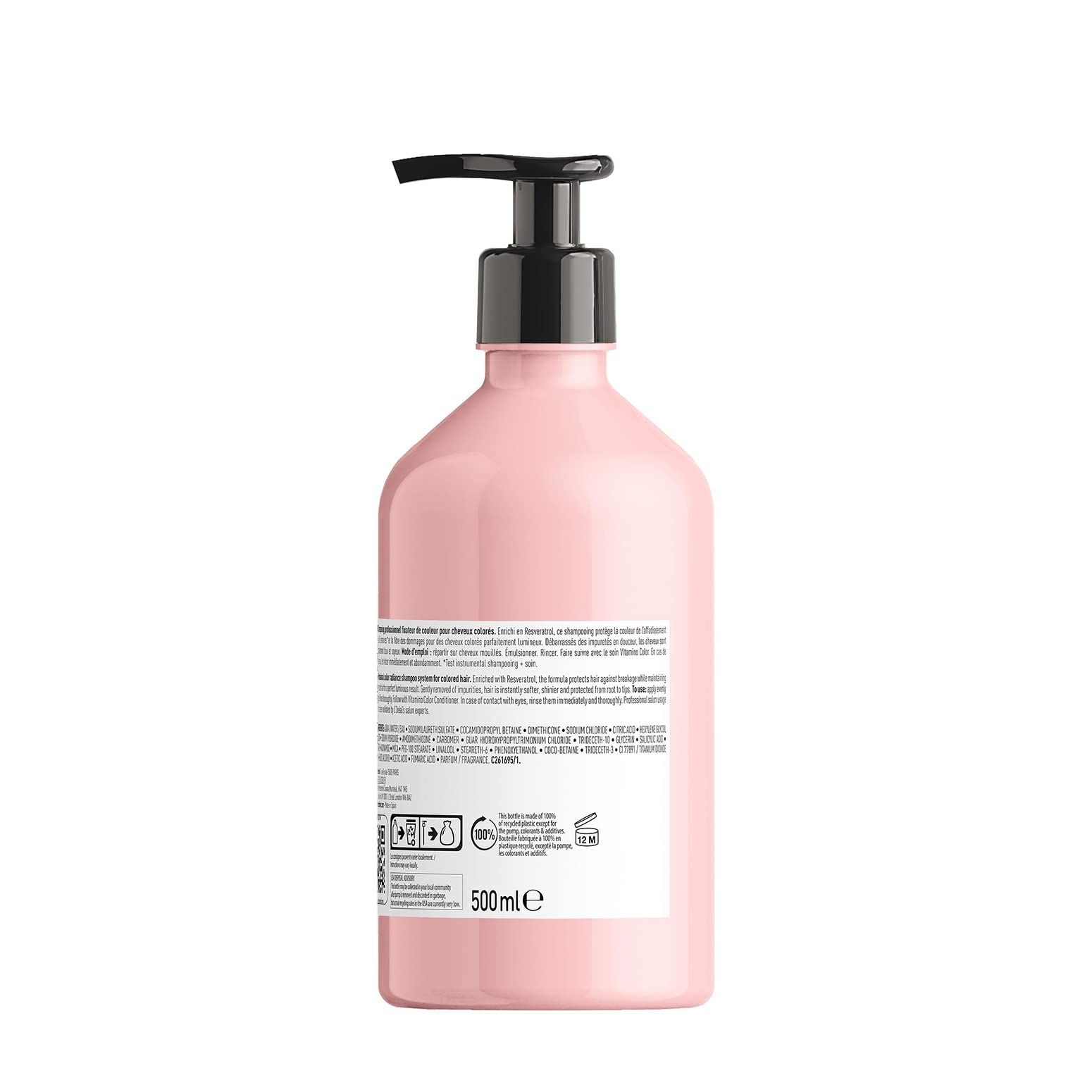 Flacon de shampooing rose avec pompe noire. Texte au dos et indication 500 ml. Contient un symbole de recyclage.