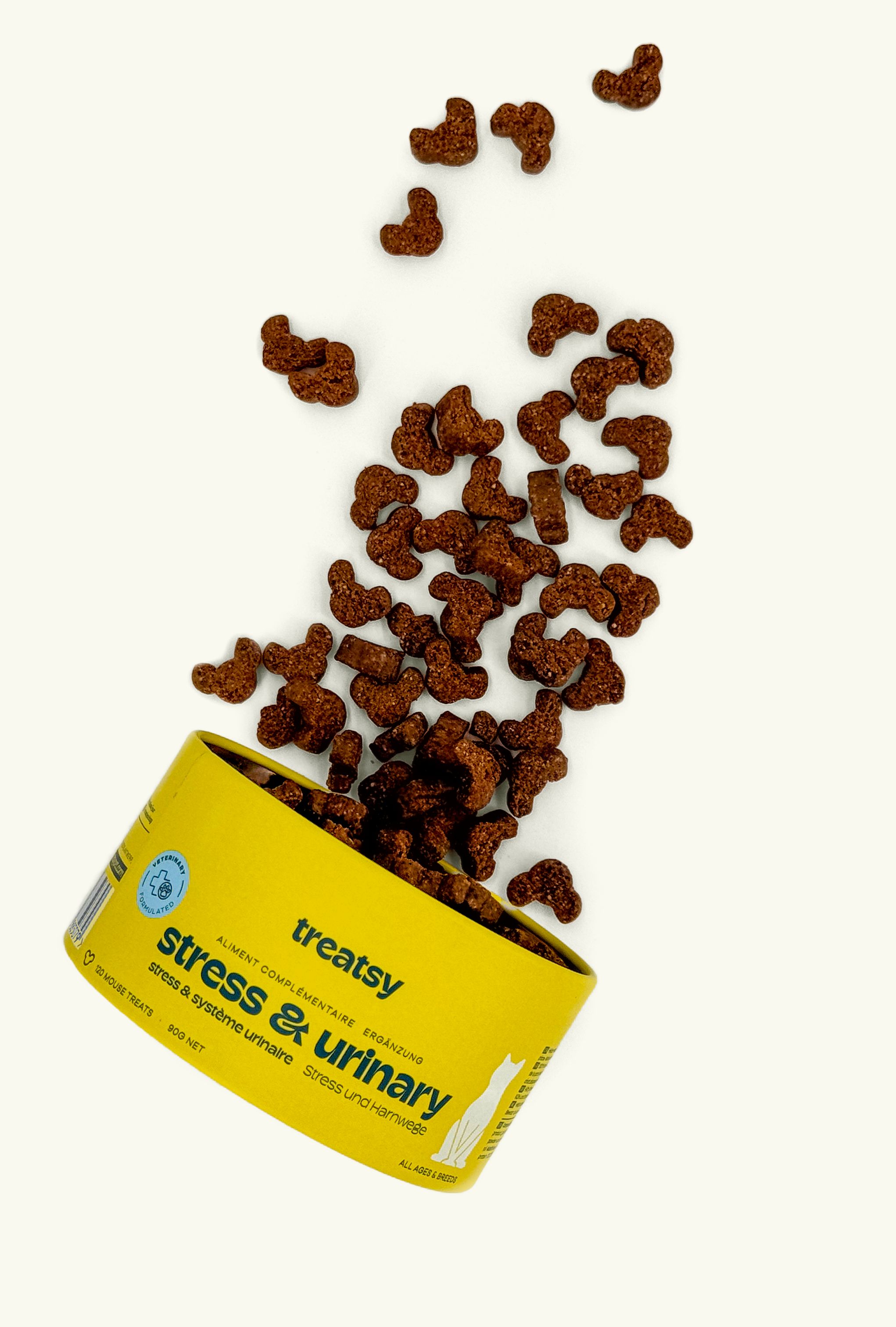 Boîte jaune « Treatsy Stress & Urinary ». Friandises qui tombent.