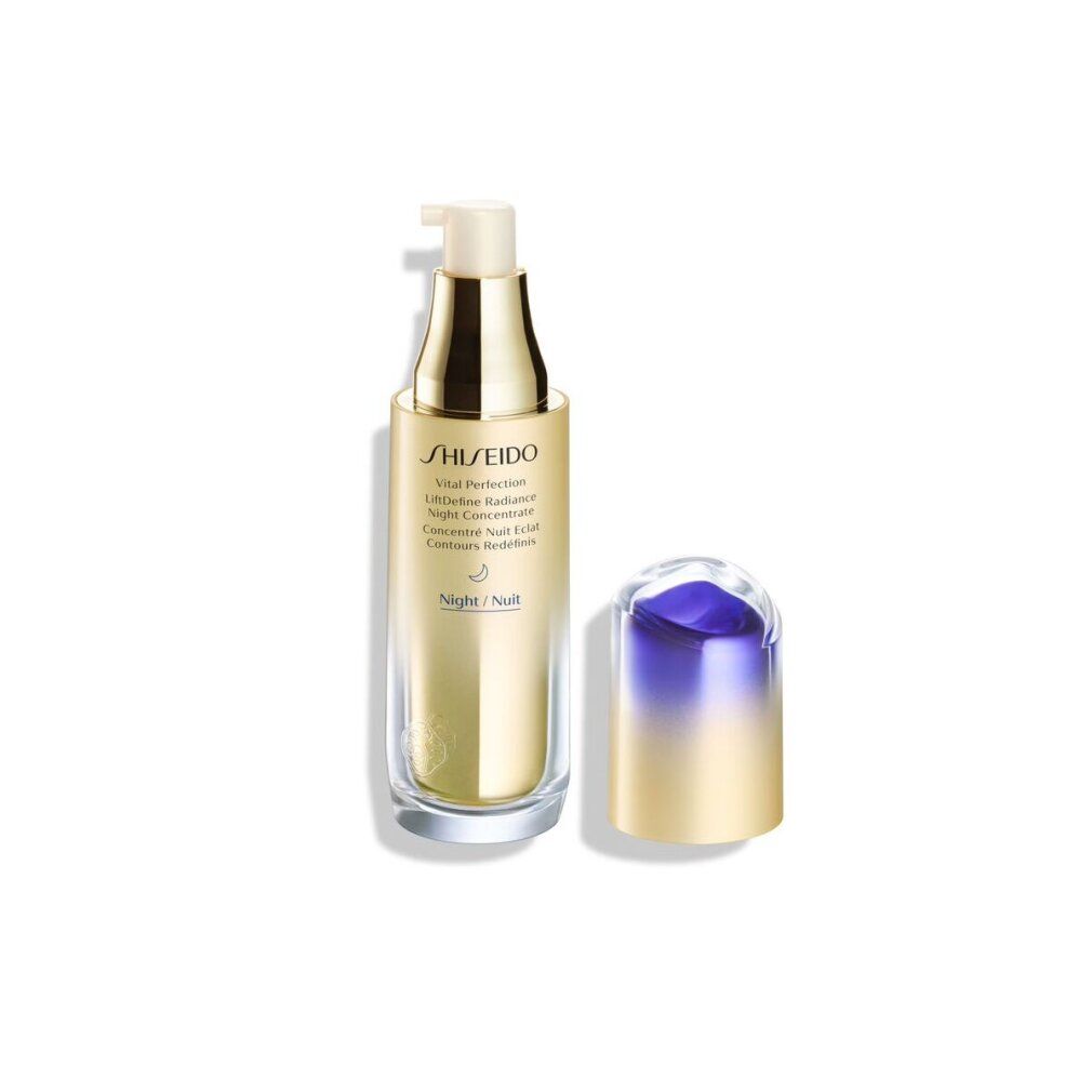 Flacon doré avec pompe et bouchon violet séparé. Inscription: Shiseido Vital Perfection LiftDefine Radiance.