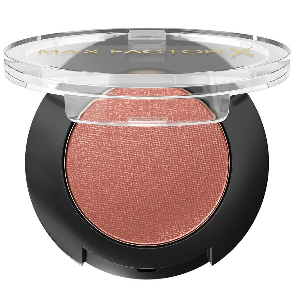 Roze oogschaduw in een zwarte houder met transparant deksel. Op het deksel staat de merknaam Max Factor.