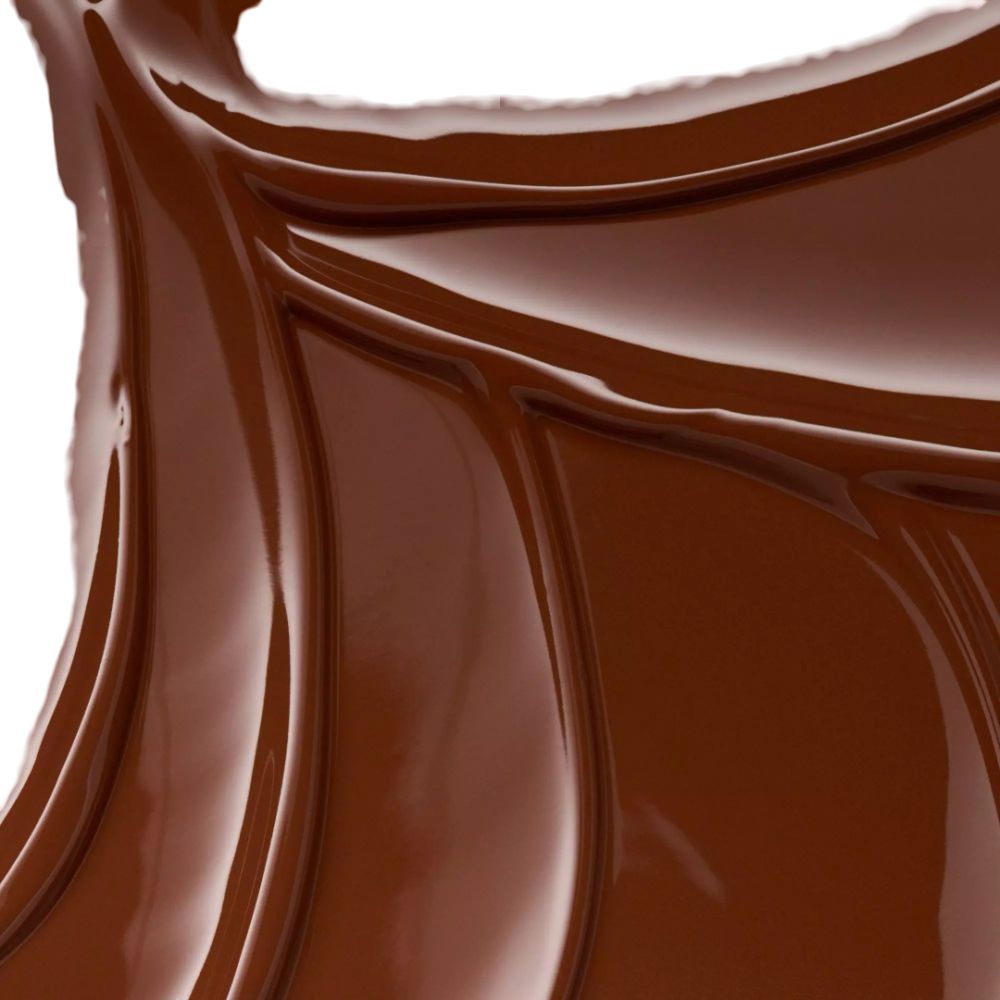 Gros plan de rouge à lèvres fondu. Couleur marron, brillant.