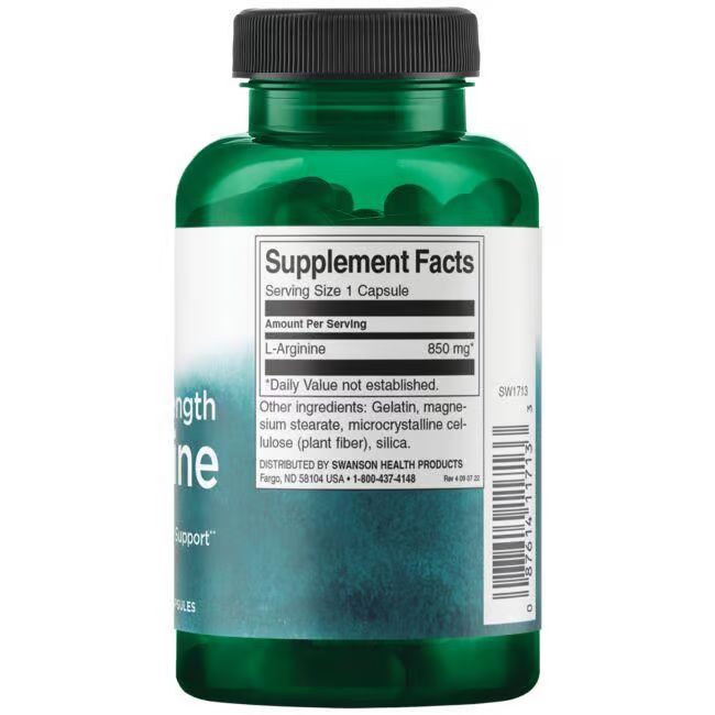 Dos d'une bouteille verte. Étiquette avec informations nutritionnelles: L-Arginine 850 mg. Autres ingrédients et informations fabricant.