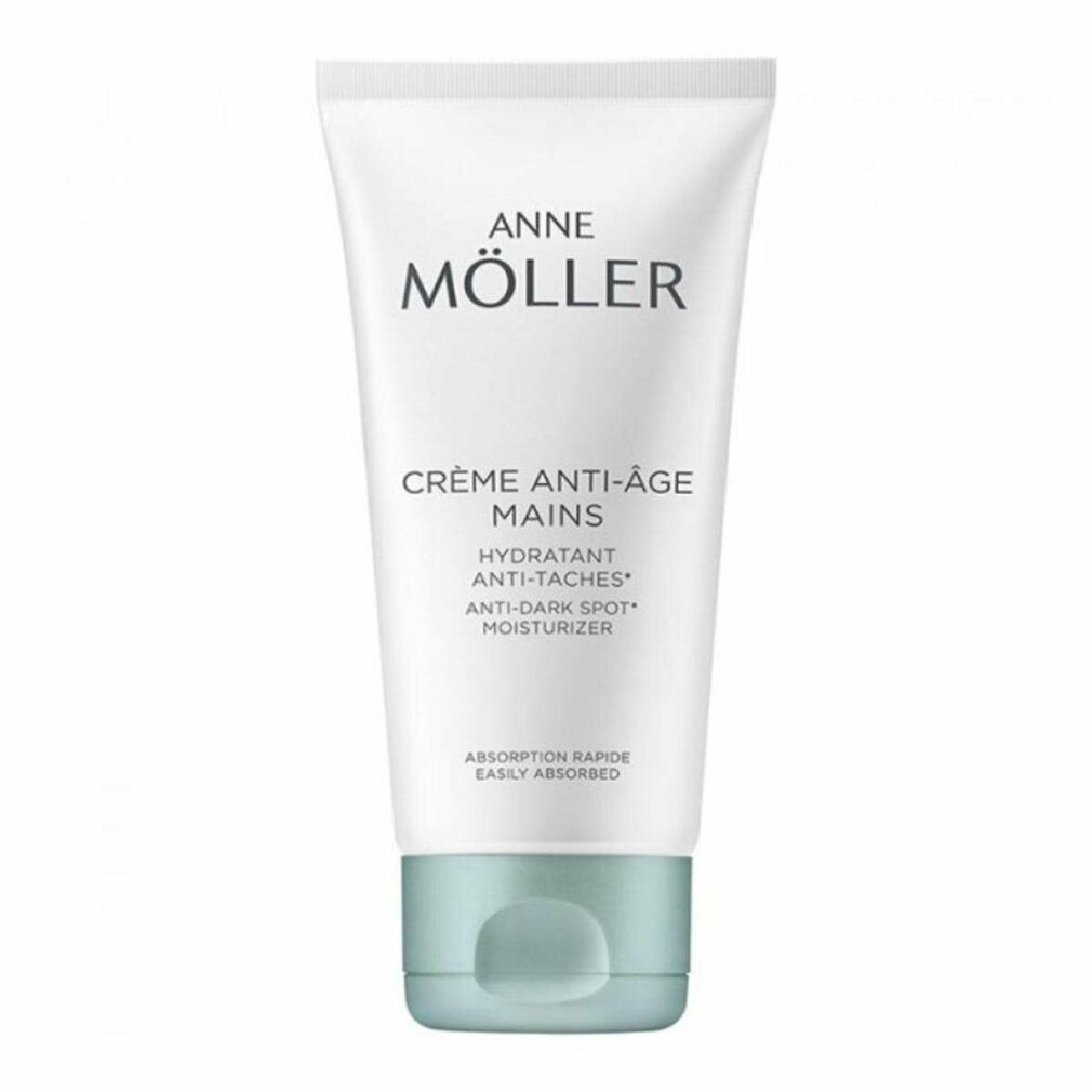 Witte tube met blauwe dop. Opschrift: ANNE MÖLLER, CRÈME ANTI-ÂGE MAINS, HYDRATANT ANTI-TACHES, ANTI-DARK SPOT, MOISTURIZER.