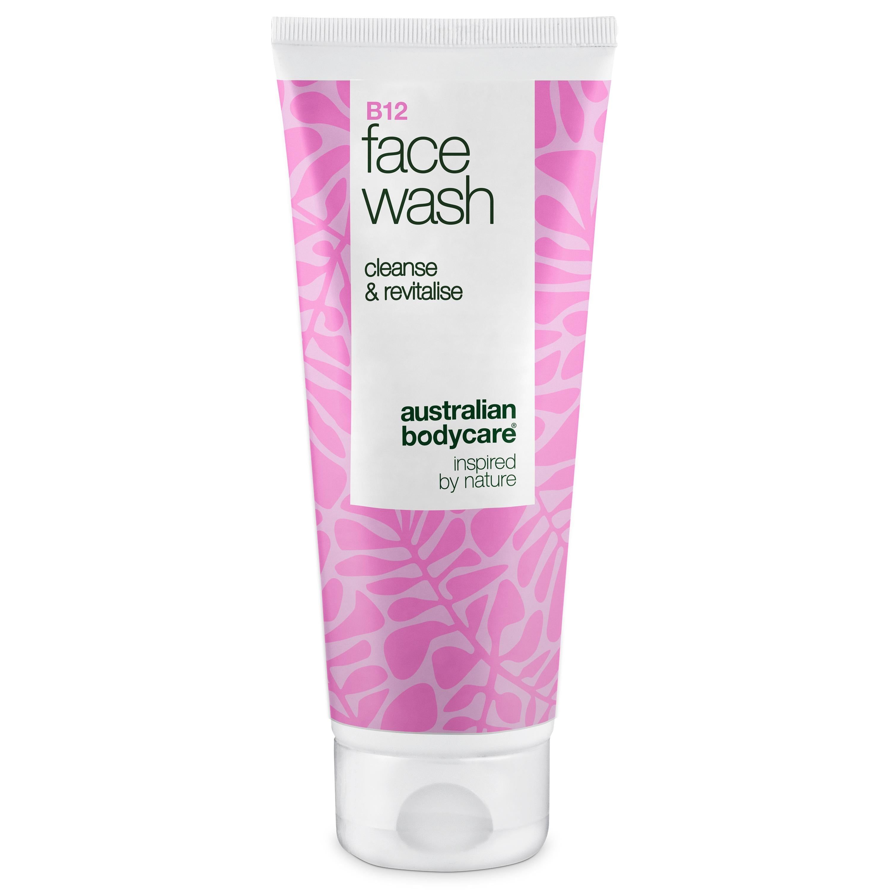 Tube de Nettoyant Visage B12. Bouchon blanc, motif rose. Texte: B12 face wash, cleanse & revitalise, Australian Bodycare.