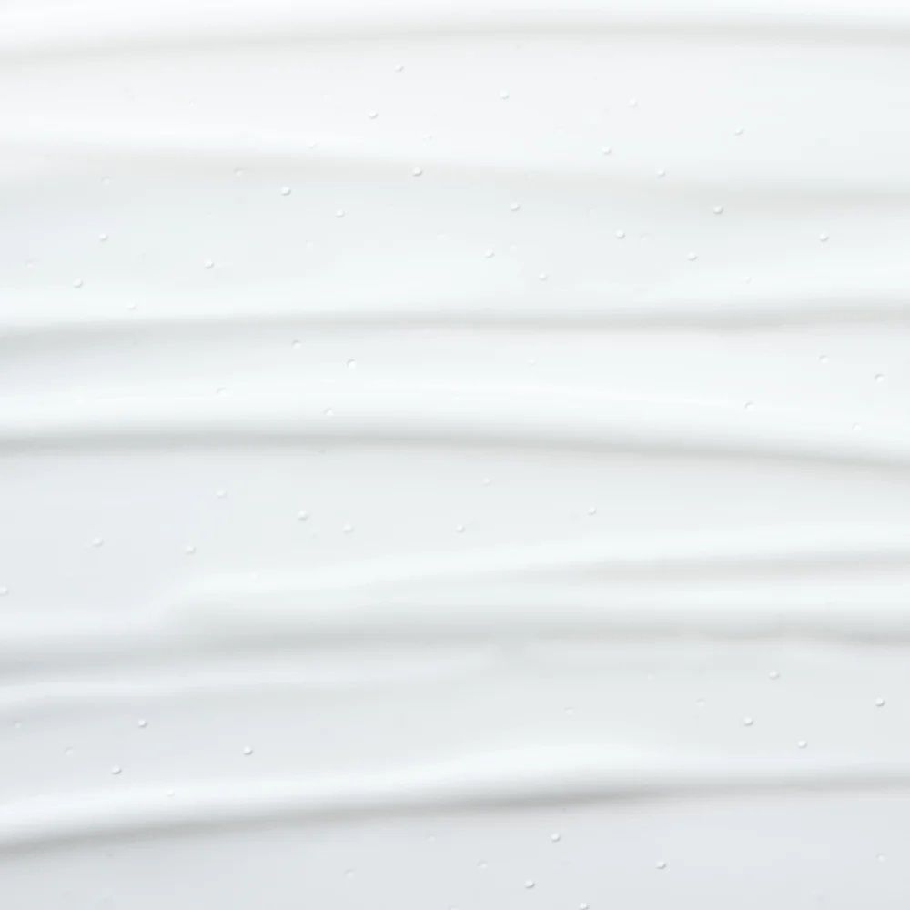 Close-up van crème strepen. Op witte achtergrond.