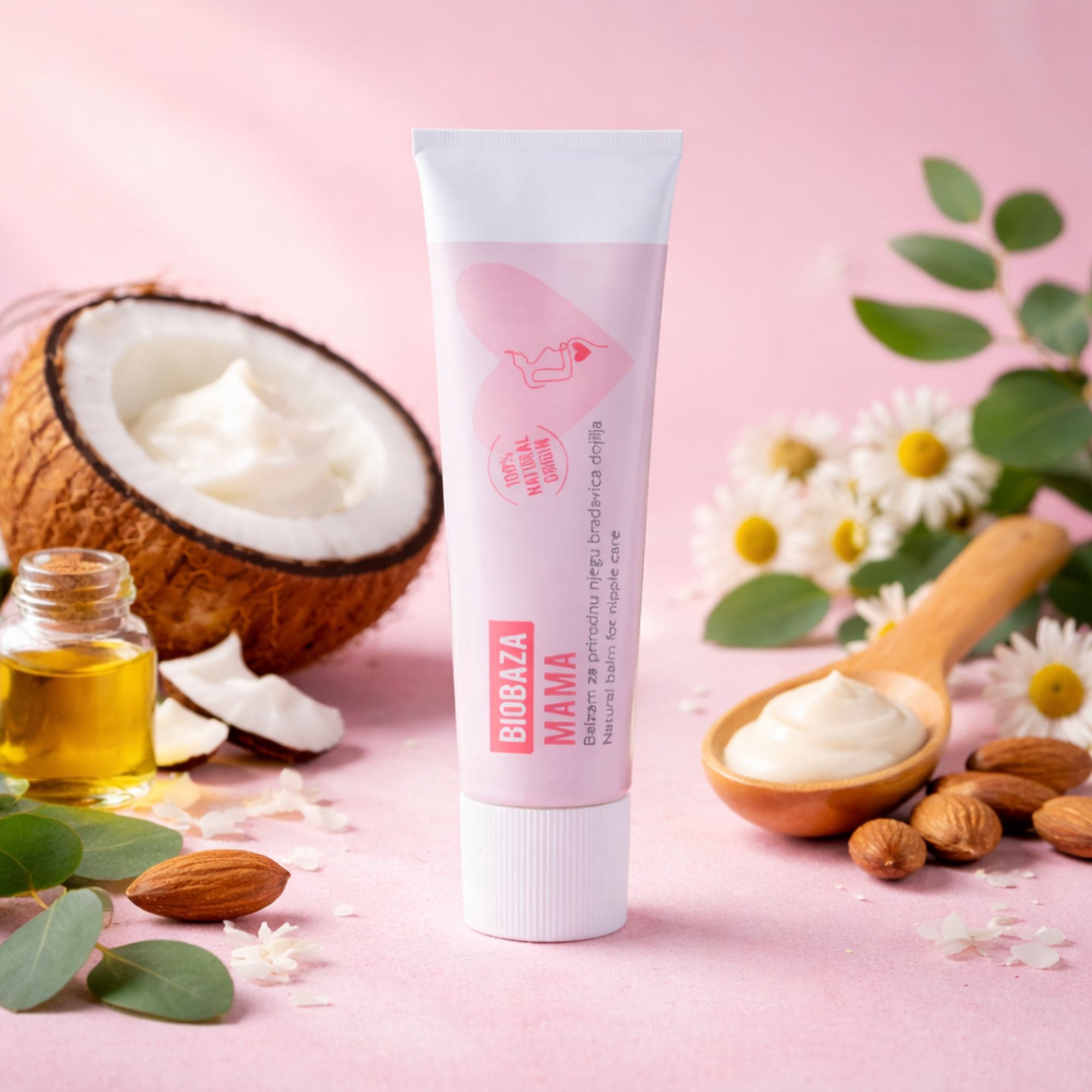 Roze tube met witte dop. Tekst: Biobaza Mama, tepelzalf. Kokosnoot, olie, amandelen en crème.