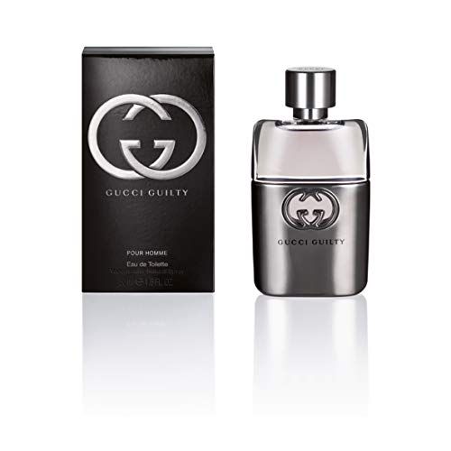 Flacon de parfum Gucci Guilty Pour Homme et son emballage. Emballage noir avec logo. Flacon argenté avec logo.