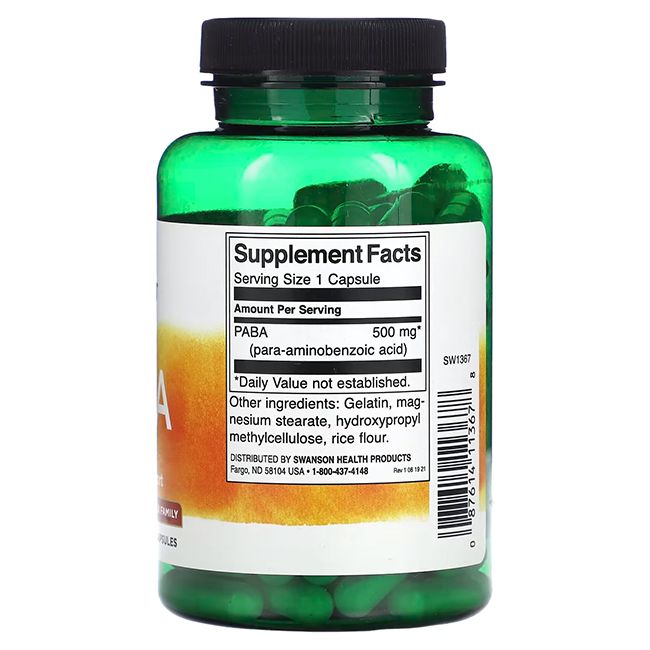 Dos d'une bouteille verte de capsules. Étiquette avec informations nutritionnelles et ingrédients: PABA.