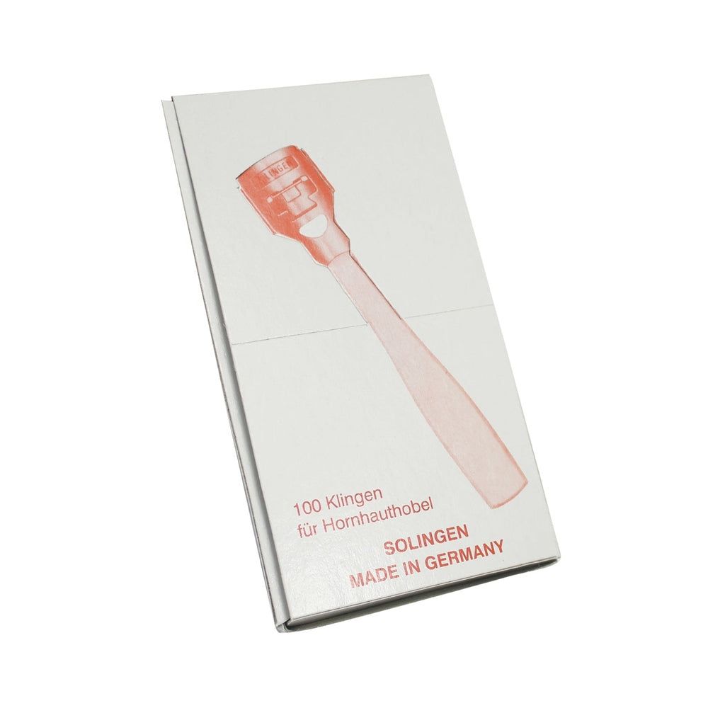 Verpakking met 100 mesjes voor eeltrasp. Opschrift: Solingen, Made in Germany. Productafbeelding in rood.