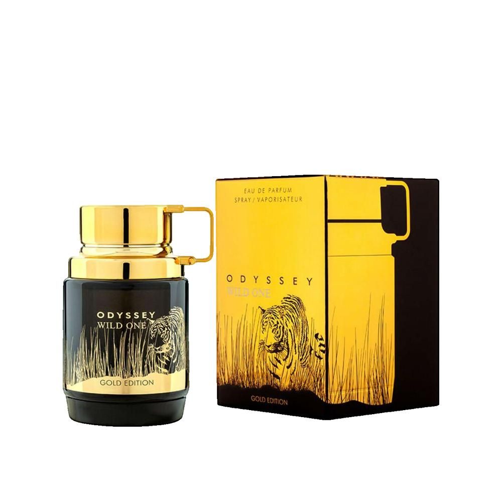 Flacon noir avec emballage doré. Flacon: ODYSSEY WILD ONE GOLD EDITION. Emballage: illustration de tigre et nom du produit.