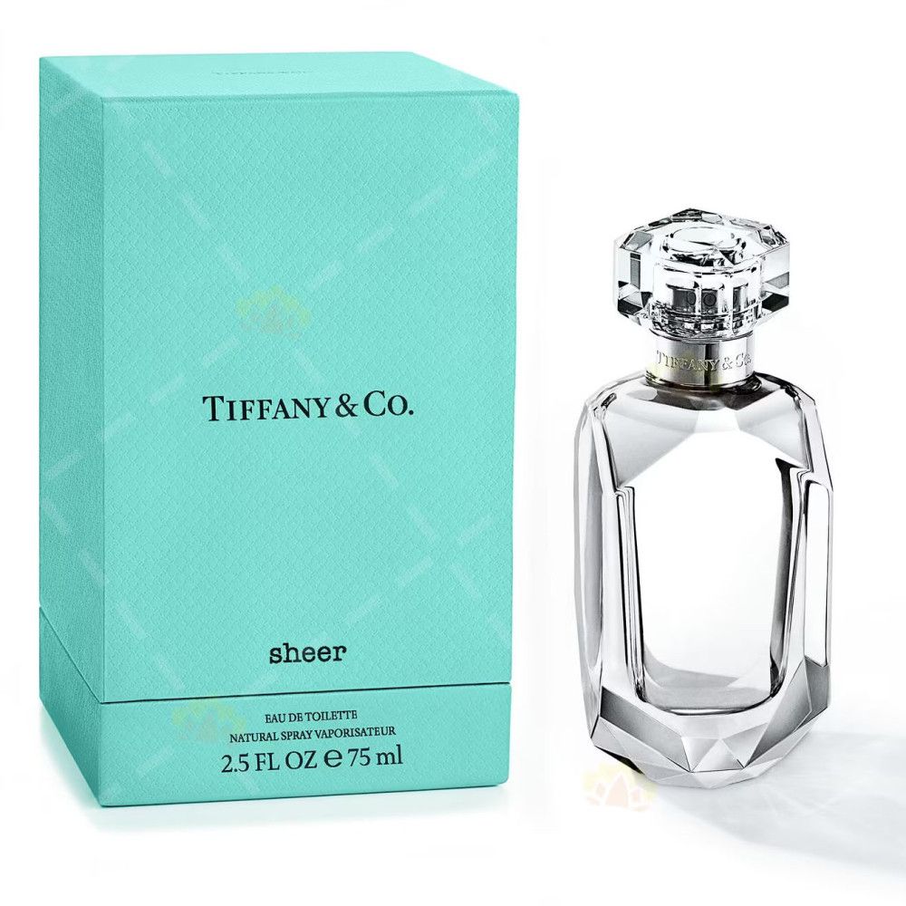 Boîte turquoise et flacon de parfum. Sur la boîte, "Tiffany & Co." et "sheer". Le flacon est transparent.