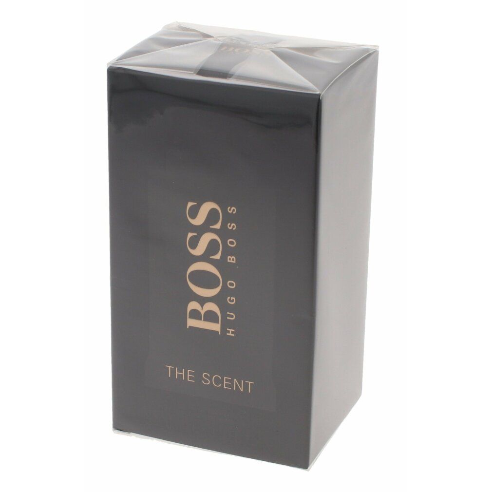 Zwarte doos, geseald. Opschriften BOSS en THE SCENT in goud.