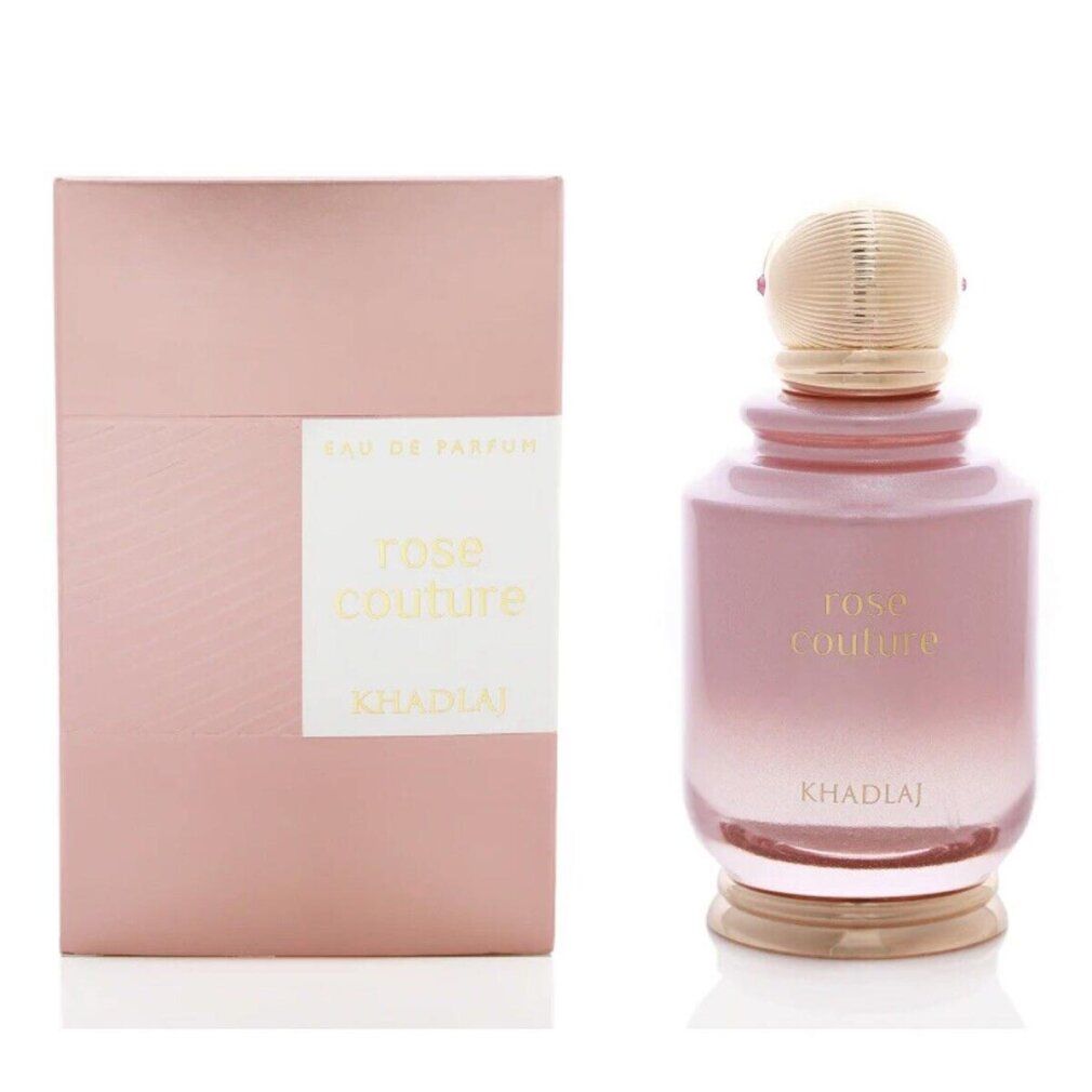 Flacon de parfum rose avec bouchon doré et boîte assortie.