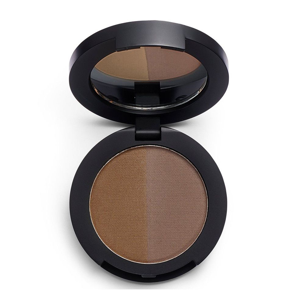 Palette de poudre à sourcils ronde ouverte. Deux teintes, miroir dans le couvercle. Boîtier noir, fond blanc.