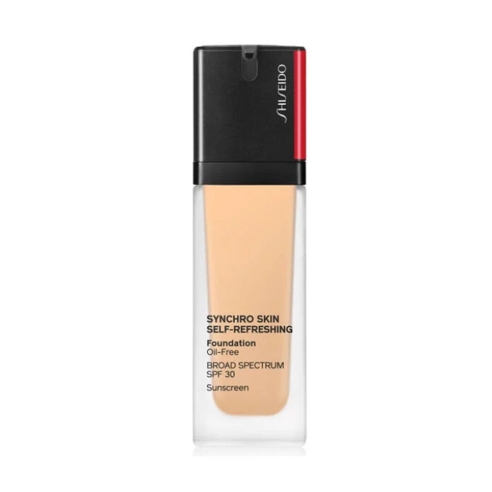 Flacon de fond de teint. Bouchon noir, accent rouge. Texte: Synchro Skin Self-Refreshing Foundation, Oil-Free, SPF 30, Sunscreen.