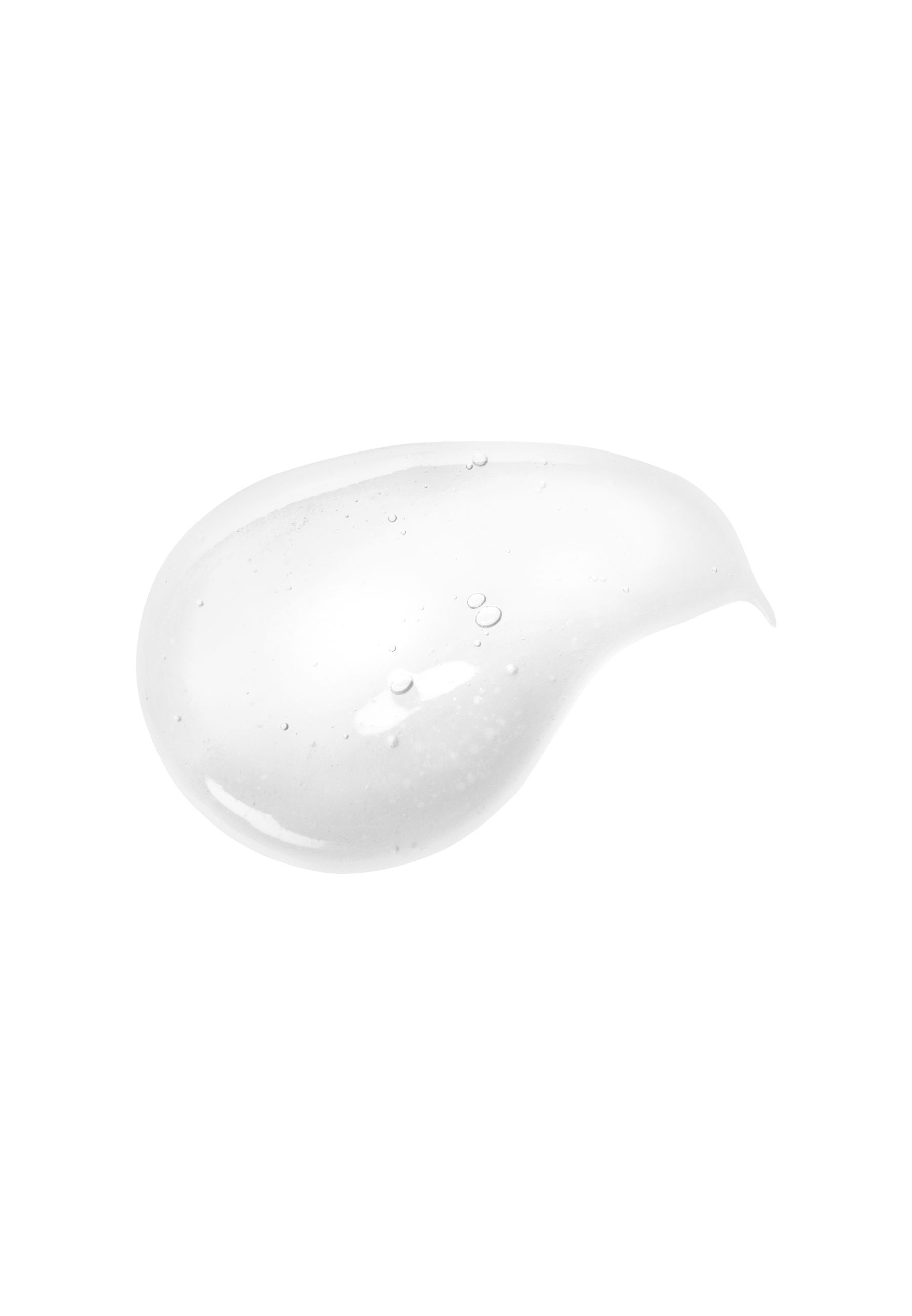 Substance claire, semblable à un gel. Quelques petites bulles visibles. Sur fond blanc.