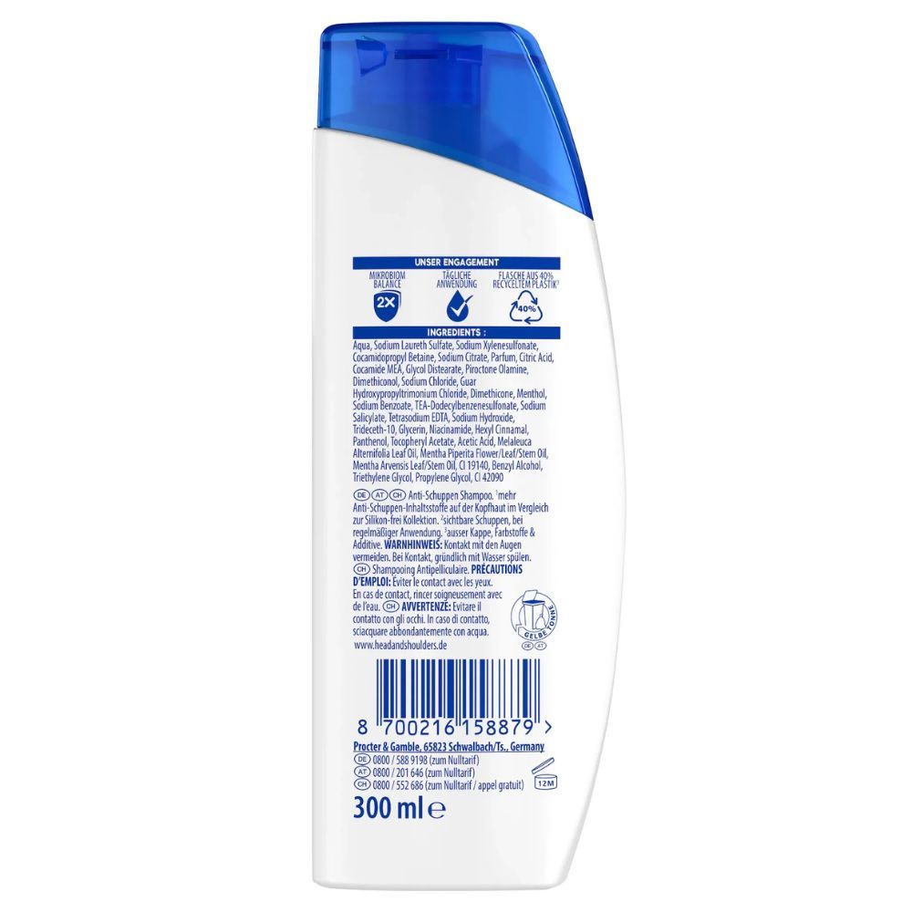 Achterkant van de shampoo fles. Ingrediënten, recycling symbool, fabrikant informatie, 300 ml.