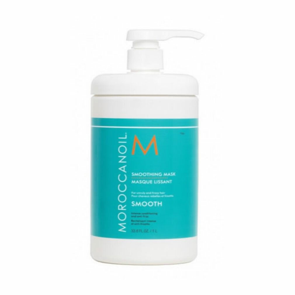 Witte fles met blauw etiket. Opschrift: Moroccanoil, Smoothing Mask, M. Met pomp.