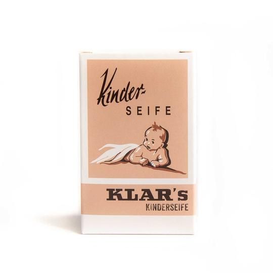 Klar-Seifen Kinderseife verpakking. Rechthoekige doos met baby-illustratie en tekst. Roze en wit.