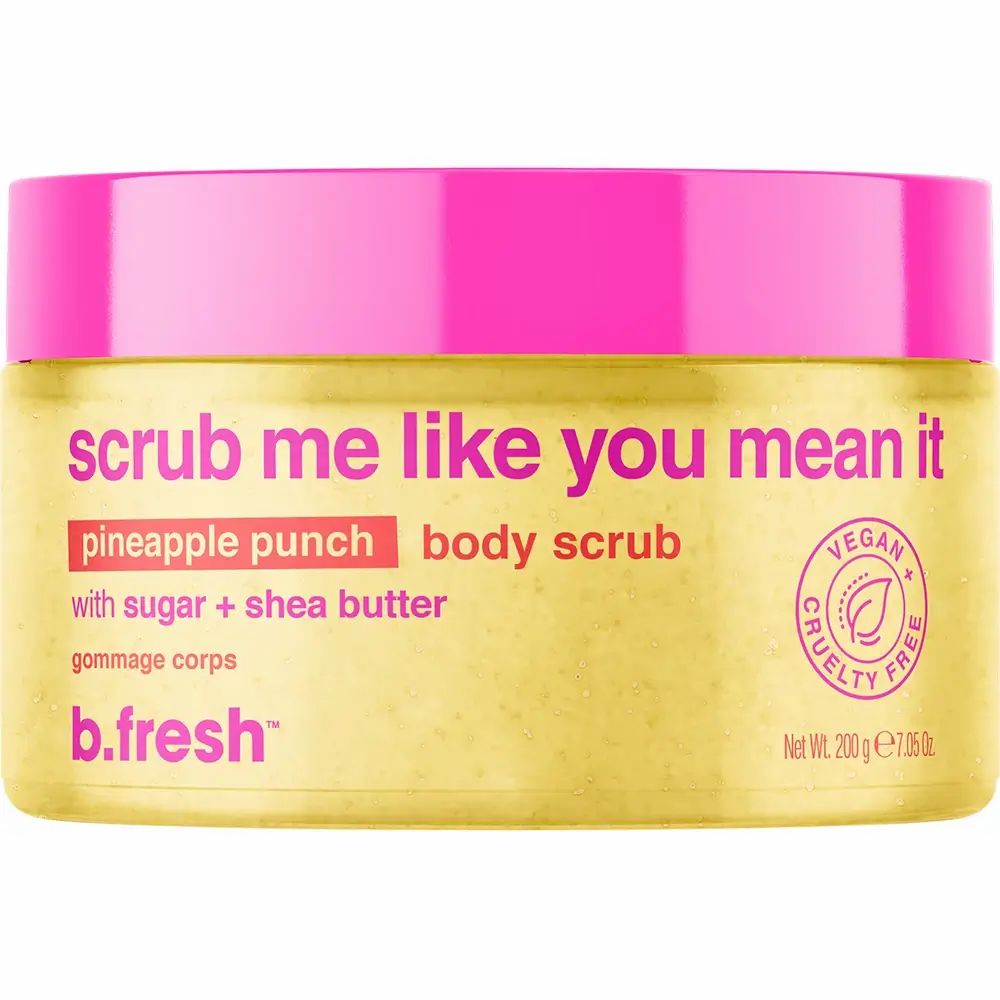 Gele bodyscrub met roze deksel. Opschrift: "Scrub me like you mean it". Vegan en dierproefvrij.