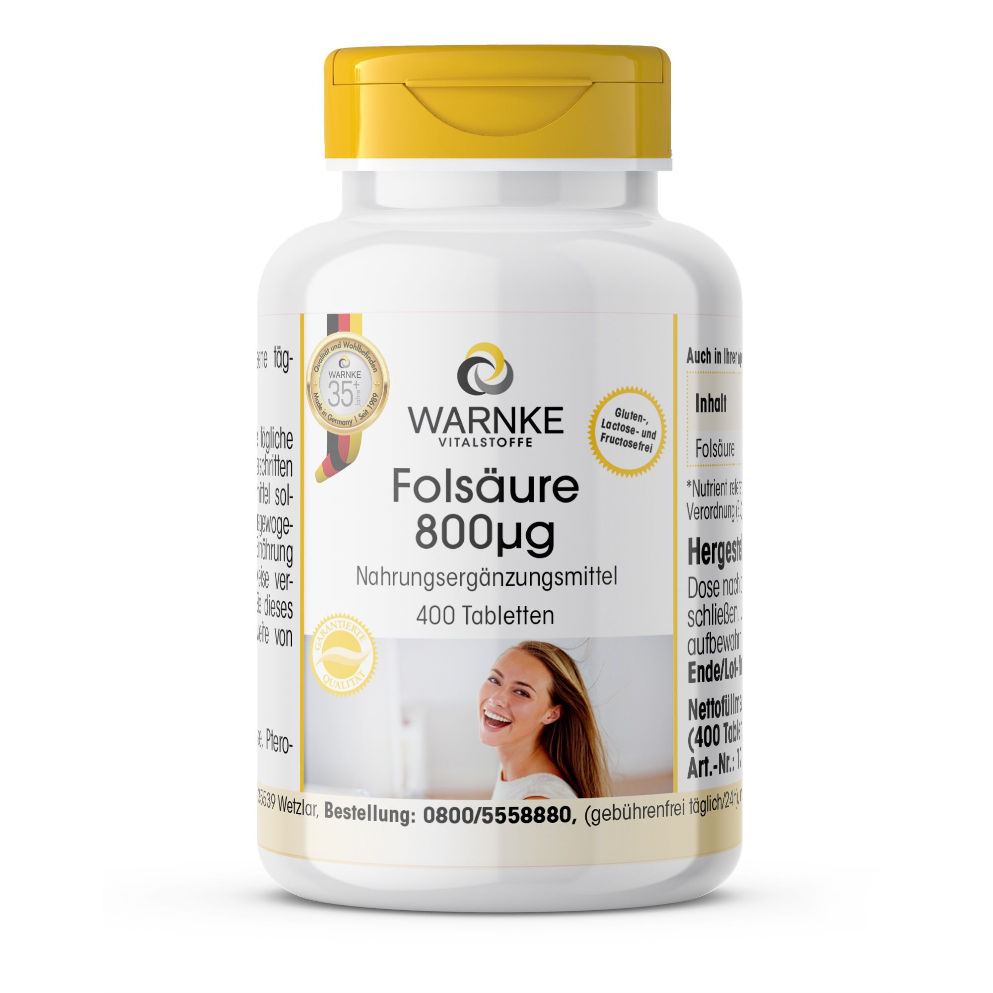 Flacon blanc avec bouchon jaune. Inscription : Warnke Vitalstoffe Folsäure 800µg, 400 comprimés. Complément alimentaire. Avec visage de femme.