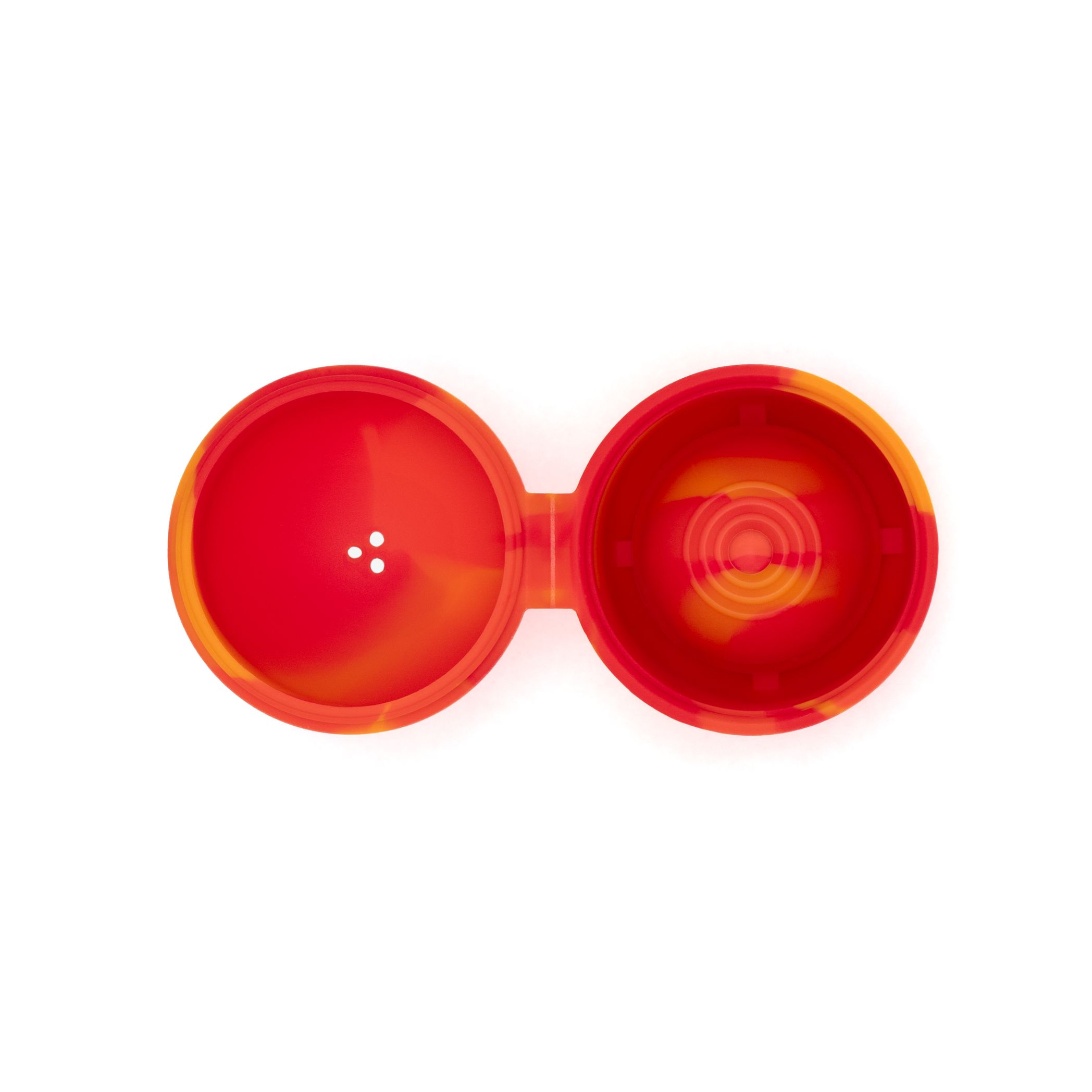 Vue de dessus d'un récipient de nettoyage rouge-jaune-orangé ouvert. Deux chambres rondes, matériau en silicone.