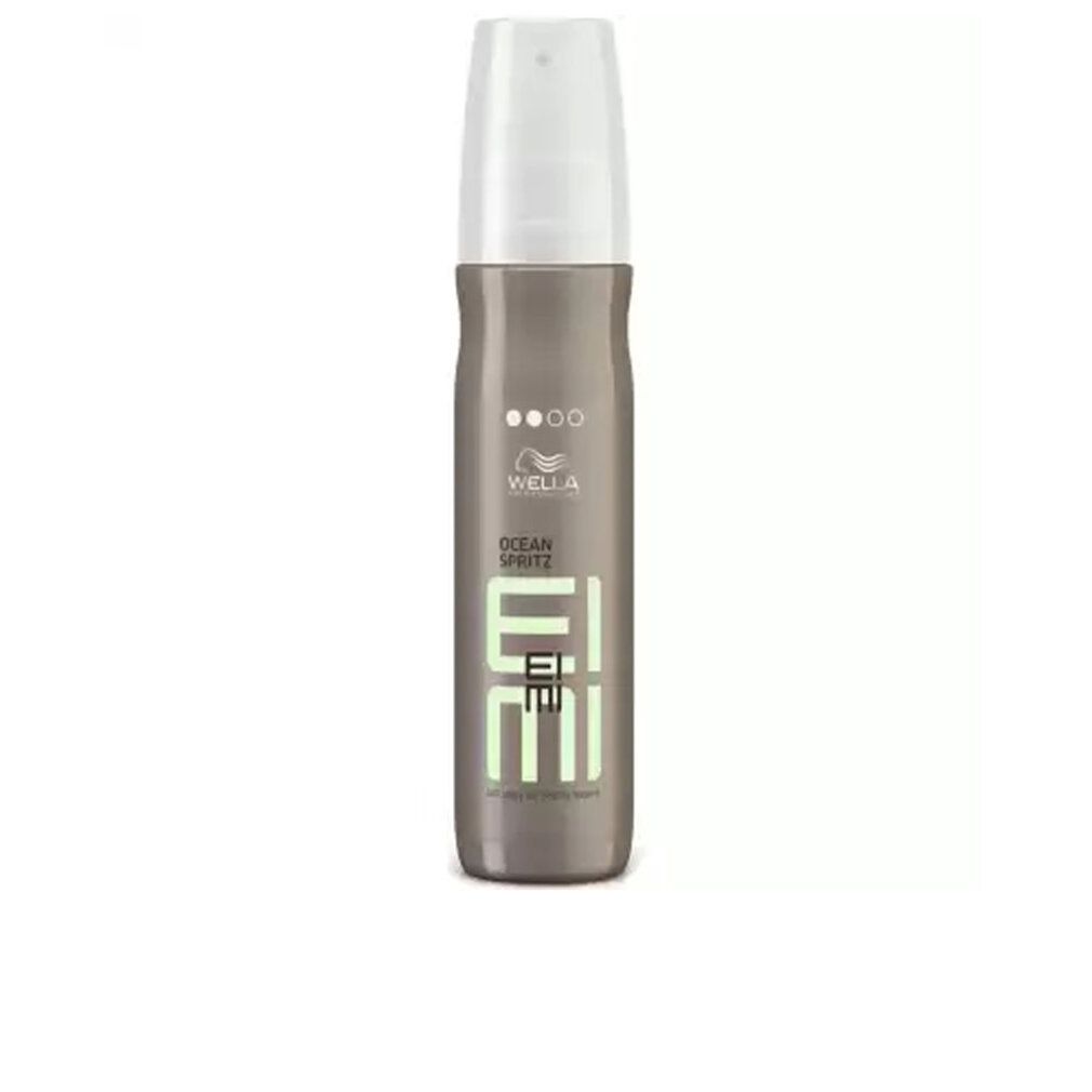 Flacon de spray coiffant. Bouteille grise avec tête de pulvérisation blanche. Inscription : Wella EIMI Ocean Spritz.